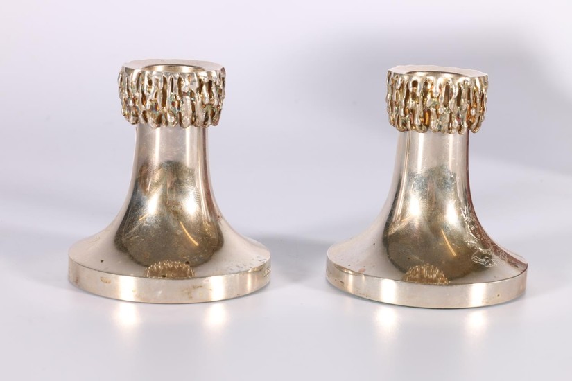 Pair of silver dwarf candlesticks of tapering shape with det...