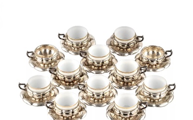 Porcelain coffee set in silver. 1920s