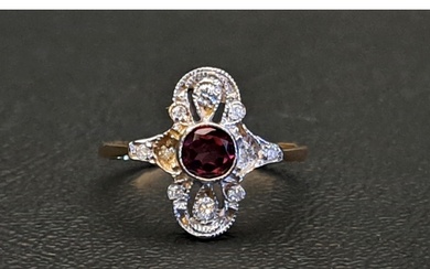 RHODOLITE AND DIAMOND PLAQUE STYLE RING the central round cu...