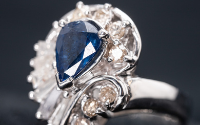 Ring with sapphire and diamonds.