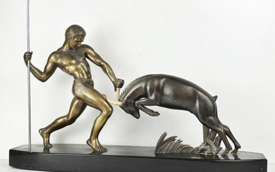 Scultura in bronzo patinato raff.te Uomo primitivo con lancia in...