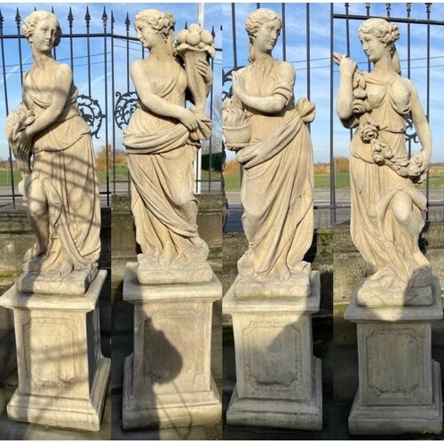 Set of four composite stone models of The Four Seasons mount...