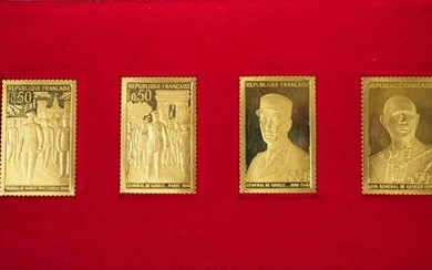 Suite de quatre reproductions de timbres en or...