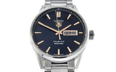 TAG HEUER - a Carrera Calibre 5 bracelet watch. Stainless steel case with exhibition case back. Case