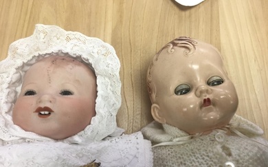 Three German bisque head dolls together with pram and star b...