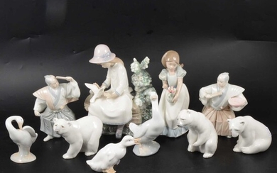 Three Lladro polar bears, other Nao and similar Spanish figurines.