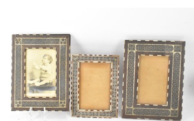 Three similar Persian late Qajar dynasty photograph frames, ...