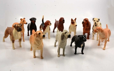 Twelve Beswick dogs.