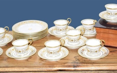 Twelve cups and saucers and six dessert plates...
