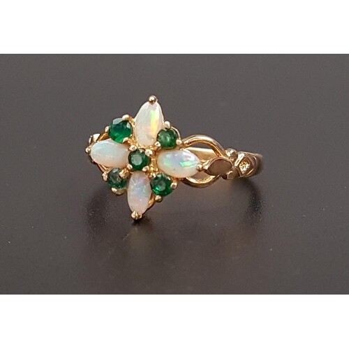 UNUSUAL OPAL AND EMERALD CLUSTER RING the four oval cabochon...