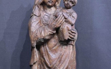 "Vierge à l'enfant" Sculpture en chêne sculpté patiné cirée. Travail d'art populaire fin XVIII° début...