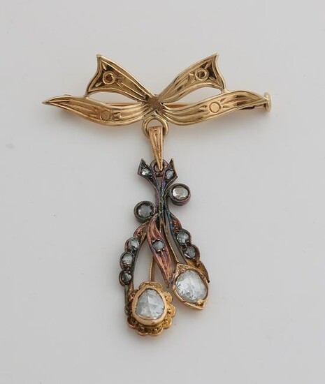 Yellow gold bow brooch, 585/000, with a pendant with