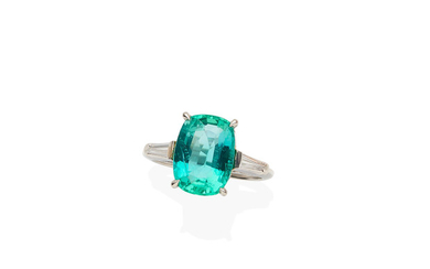 A emerald and diamond ring