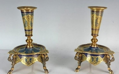 A PAIR OF FRENCH CHAMPLEVE ENAMEL CANDEL HOLDERS