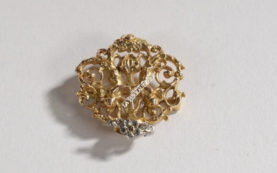 18k yellow gold brooch with openwork putti decoration...