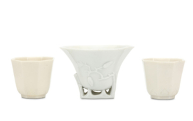 A PAIR OF CHINESE BLANC-DE-CHINE OCTAGONAL BEAKER CUPS....