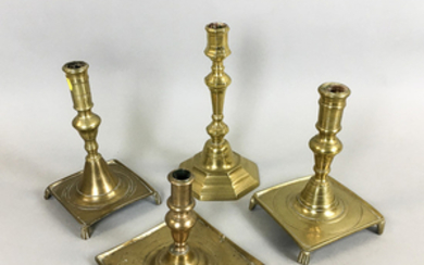 Four Early Brass Candlesticks