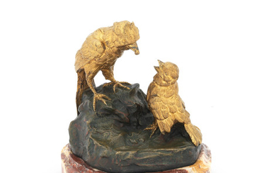 A gilt and patinated bronze group of two birds