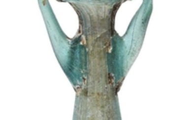 A Roman green glass vial, 4th-5th century...