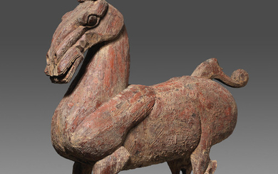 A very large and rare lacquered-wood model of a horse