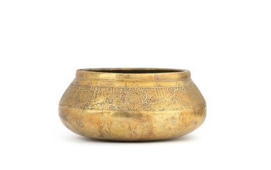 A silver-inlaid brass bowl