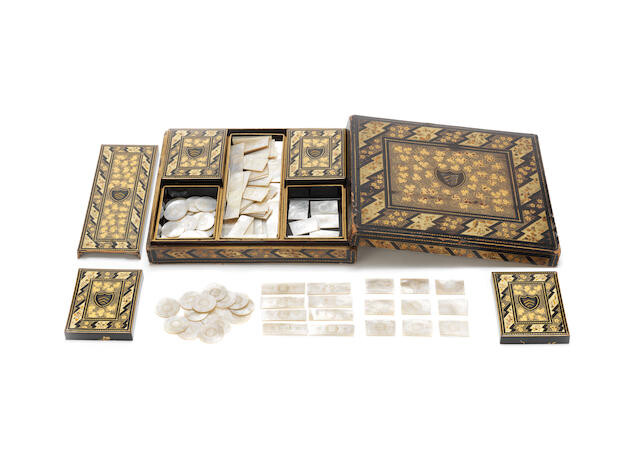 An export gilt-lacquer games box and set of mother-of-pearl counters