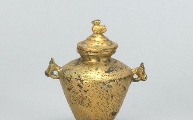 MINIATURE CHINESE GILT-BRONZE COVERED VASE With animal-head handles and a bird finial. Height 3.25".