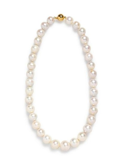 A 14 Karat Yellow Gold and Cultured South Sea Pearl