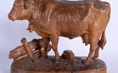A 19TH CENTURY BAVARIAN BLACK FOREST FIGURE OF A COW