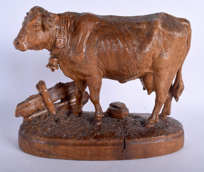 A 19TH CENTURY BAVARIAN BLACK FOREST FIGURE OF A COW