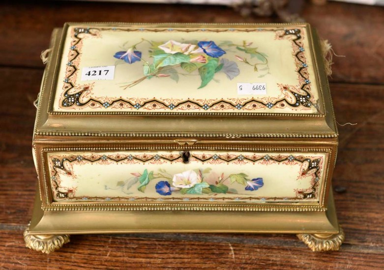 A 19TH CENTURY FRENCH BRASS AND HAND PAINTED PORCELAIN FOOTED SEWING BOX WITH ENAMEL DECORATION