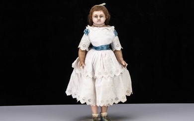 A 19th century English poured wax child doll