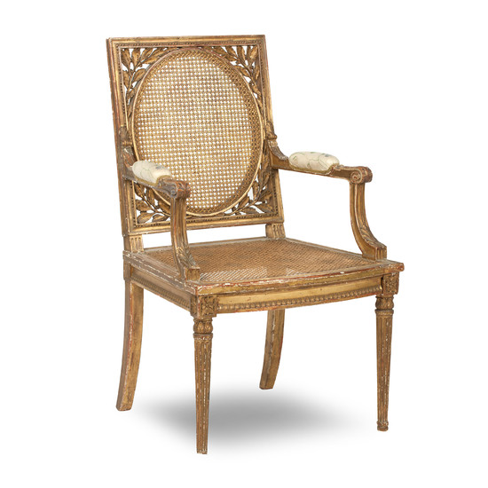 A 19th century French carved giltwood open armchair