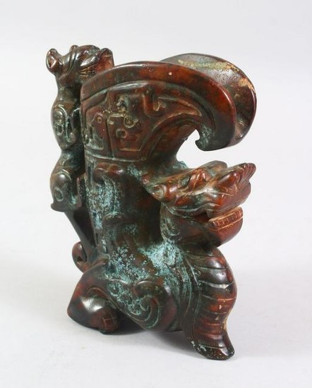 A 20TH CENTURY CHINESE ARCHAIC STYLE CARVED HARDSTONE