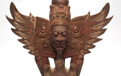 A BALINESE DOUBLE-SIDED FIGURE OF A WINGED DEMON 19TH CENTURY