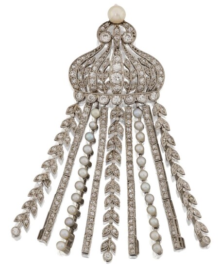 A Belle Epoque platinum and diamond tassel pendant, the old-brilliant-cut diamond pierced crown top suspending a fringe of articulated diamond, seed pearl and foliate link line drops, to a seed pearl terminal, c.1910, approx. length 5.7cm (VAT...