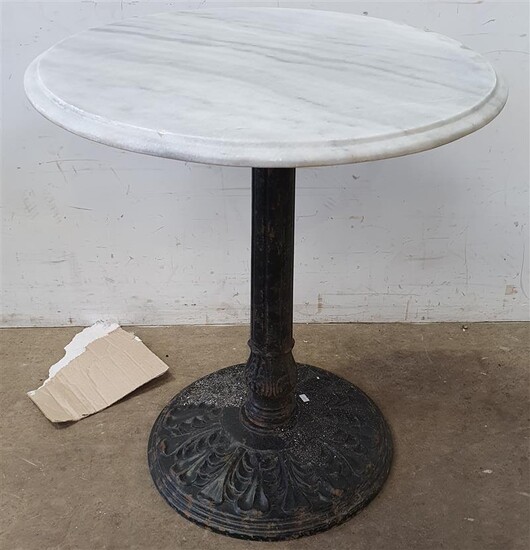 A CAST IRON BASE MARBLE TOP TABLE