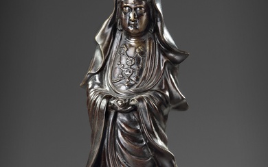 A CHINESE BRONZE FIGURE OF GUANYIN, 20TH CENTURY