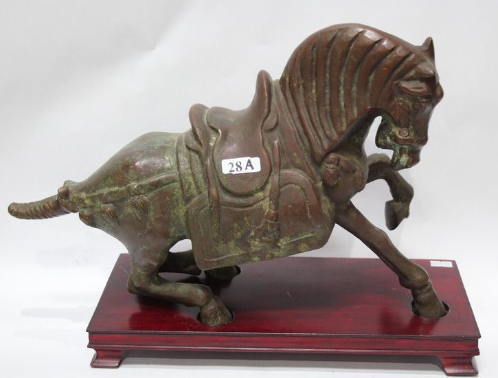 A CHINESE BRONZE SCULPTURE OF A TANG STYLE HORSE