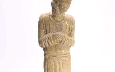 A CHINESE GLAZED POTTERY FIGURE OF OFFICIAL