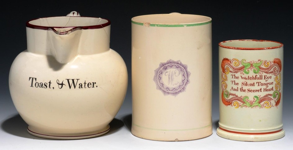 A CREAMWARE TOAST & WATER JUG AND TWO MUGS, C1800-25 the...