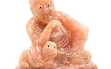 A Chinese Carved Rose Quartz Figure of a Luohan Height