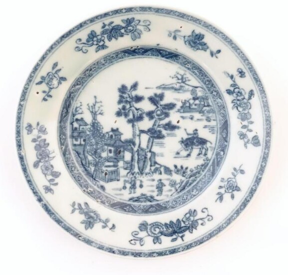 A Chinese blue and white plate depicting a landscape