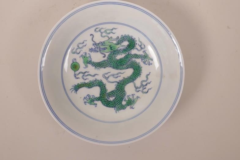 A Chinese blue and white porcelain bowl decorated with...