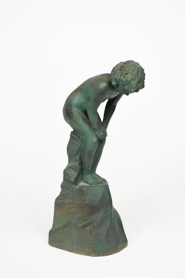 A Doulton stoneware figure of a boy designed by John Broad, modelled crouching and looking down to the ground, glazed green impressed Doulton to base, chip to back of base, 48cm. high Provenance The collection of Pam and Mark Taylor.