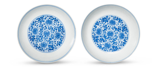 A FINE PAIR OF BLUE AND WHITE ‘FLORAL SCROLL’ DISHES, YONGZHENG SIX-CHARACTER MARKS IN UNDERGLAZE BLUE WITHIN DOUBLE CIRCLES AND OF THE PERIOD (1723-1735)