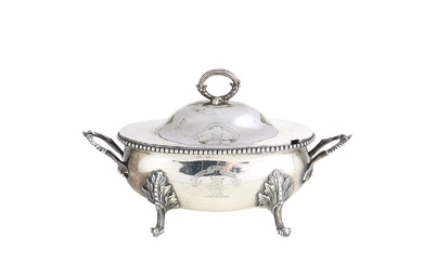 A GEORGE III STERLING SILVER SAUCE TUREEN The body with maker's mark 'I.C' or 'I.G' (rubbed), London, 1773, the cover with the mar