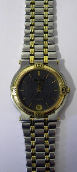 A GUCCI 9000M 'Steel and Gold' Quartz Wristwatch, 32mm case ...
