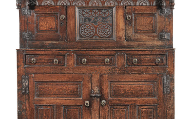 A George I joined oak court cupboard, Welsh, dated 1724
