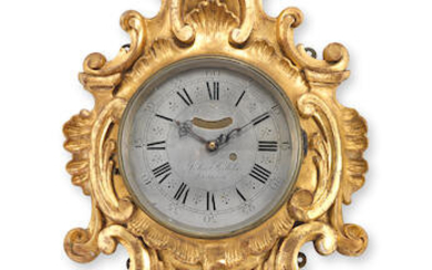 A George II giltwood cartel clock